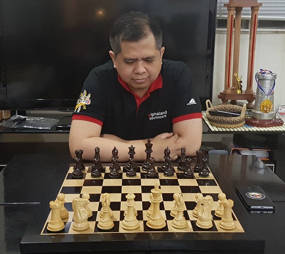 Makiikita sa larawang ito si Philippine Executive Chess Champion  Atty. Cliburn Anthony A. Orbe